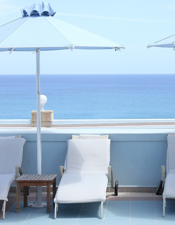 lounge chairs at beach resort