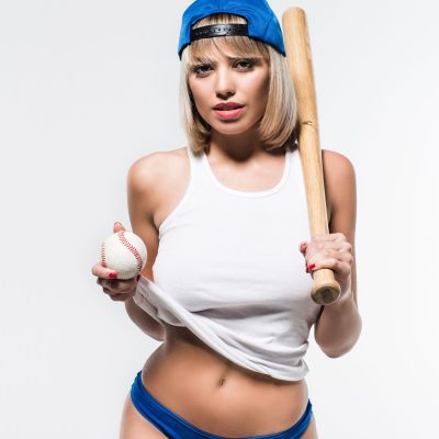 Sexy woman playing softball